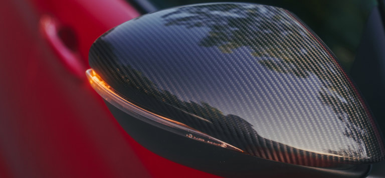 Carbon-fibre mirror caps